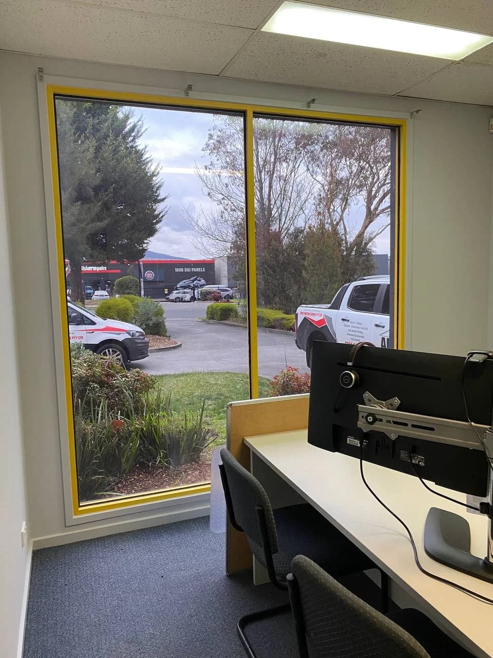 Repainted commercial office interior, walls and ceiling finished in white